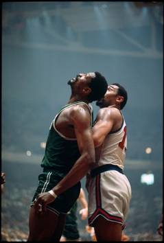 Iooss color photograph of two basketball players.